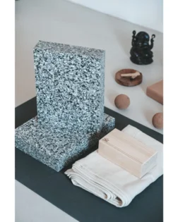 Two foam support blocks for shoulder stand providing stable, comfortable height.