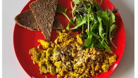 Scrambled tofu with pine nuts and salad with balsamic dressing