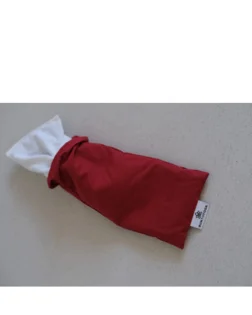 Red cotton eye pillow with flax seeds and lavender, gentle weight for relaxation.