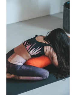 Orange organic cotton bolster pillow filled with cotton for support and comfort