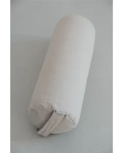 Natural linen yoga bolster with buckwheat hulls, cylindrical support for restorative yoga and pranayama.