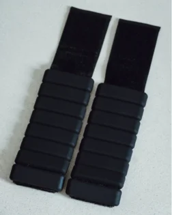 Black ankle and wrist weights, 2 × 500 g pair with adjustable hook-and-loop strap.